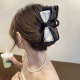 White Face Black Bottom Bow Grab Clip