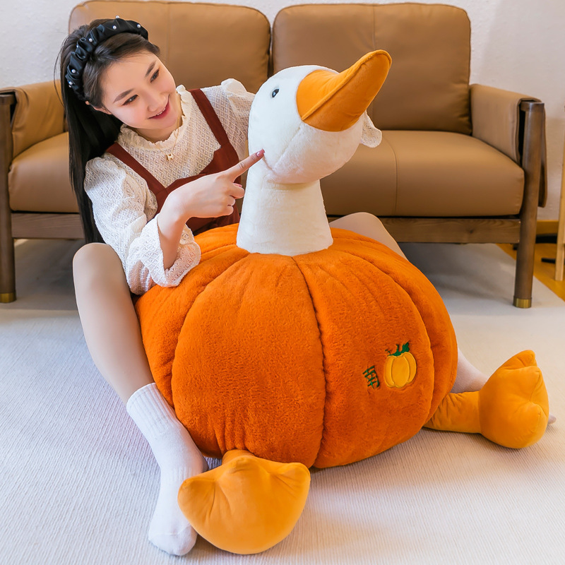 大きなガチョウのぬいぐるみの弾力綿は寝枕の人形のベッドに腹ばいになります。|undefined