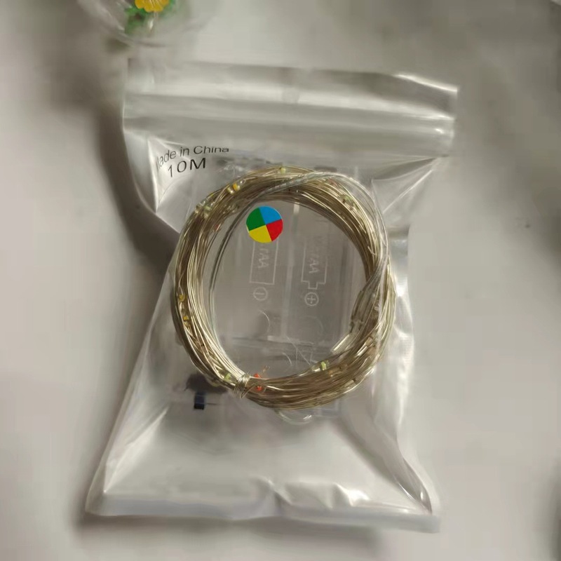 現物ledランプは銅線の銅線の電池の金をつないでランプのクリスマスの贈り物の箱をつないで童話のアンドロメダのカラーランプを飾って卸売りします。|undefined