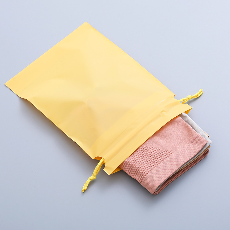 Color bundle pocket frosted waterproof drawstring cosmetics finishing storage bag socks shoes clothing storage bag wholesale