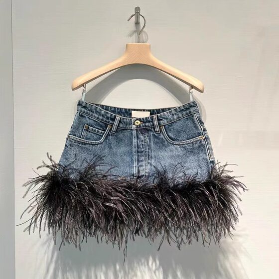 Niche design 24 early spring new personalized feather decoration Denim V-neck strap high waist skirt slimming suit