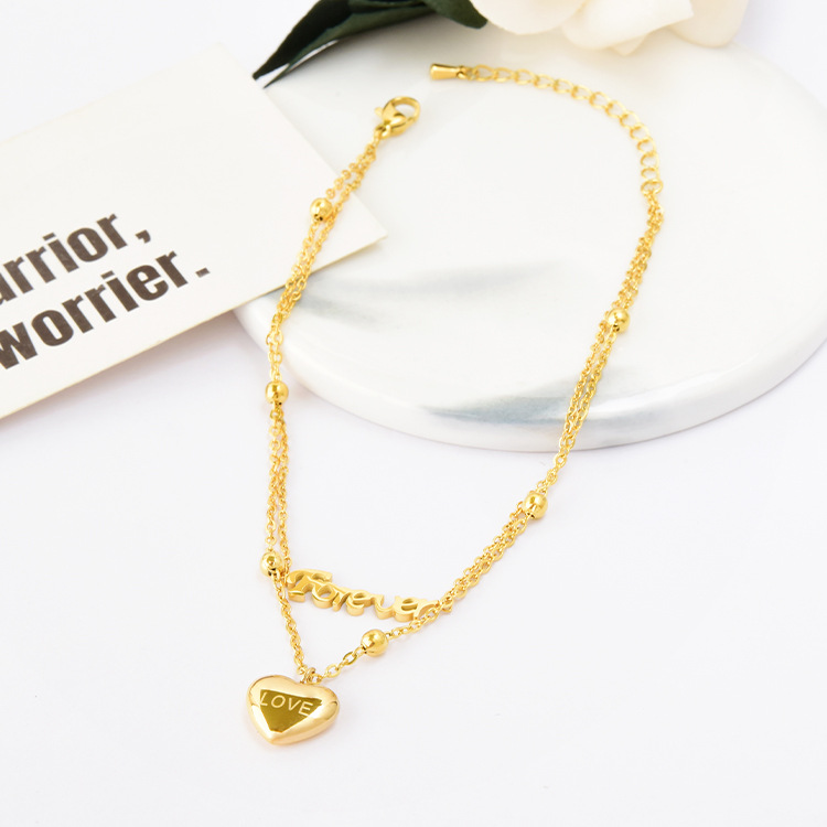 Women's Korean-style elegant double-layer letter anklet heart-shaped pendant beach anklet with water and color retention titanium steel gold anklet