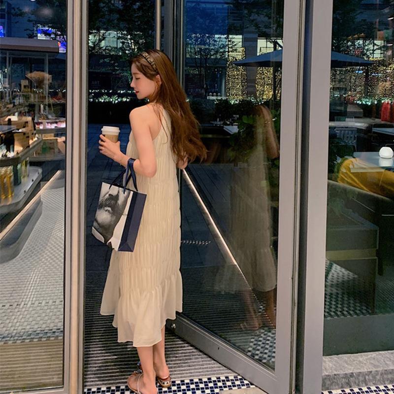Commuter summer new light luxury Sanya Seaside sling dress South Korea elegant slimming beach dress western style
