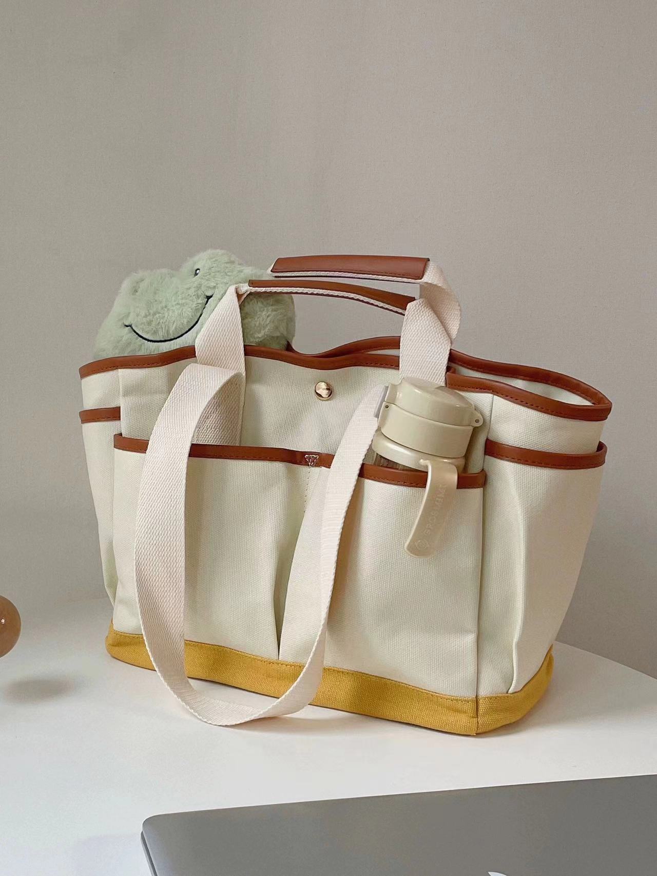 Korean-style Niche Patchwork Canvas Bag Large Capacity Multi-compartment Portable Mother and Baby Mummy Bag Practical Commuter Tote Bag_voghion.com