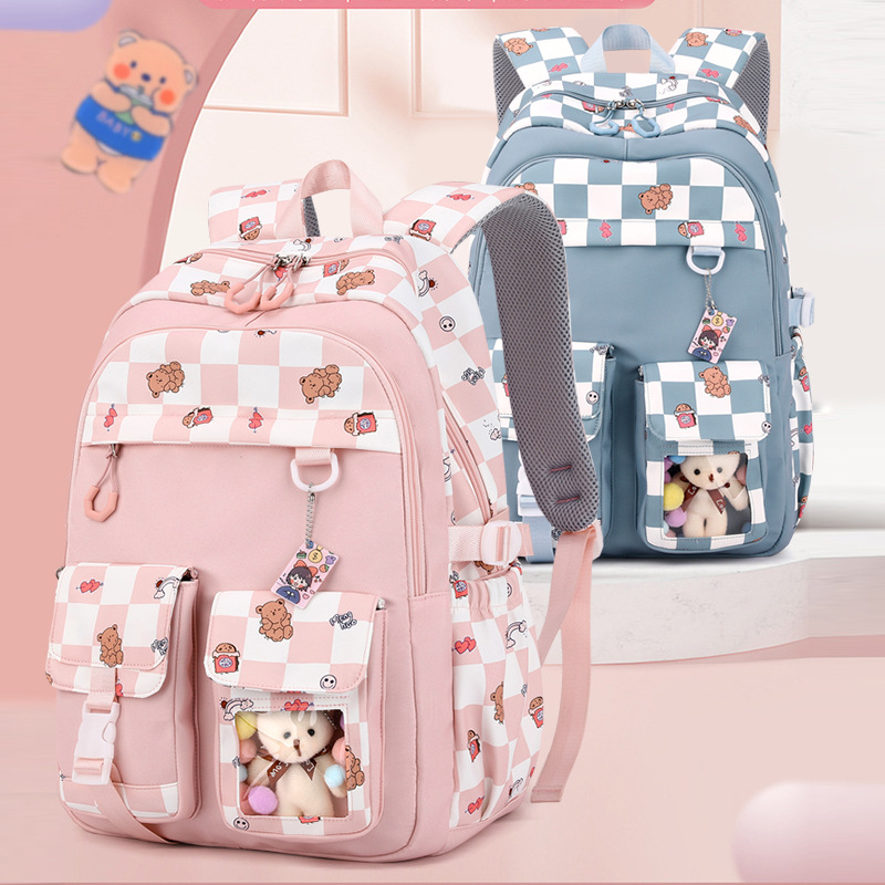 School student wholesale backpack for natural fish, reducing burden and protecting spine, suitable for grades 3 to 6 and junior high school students.