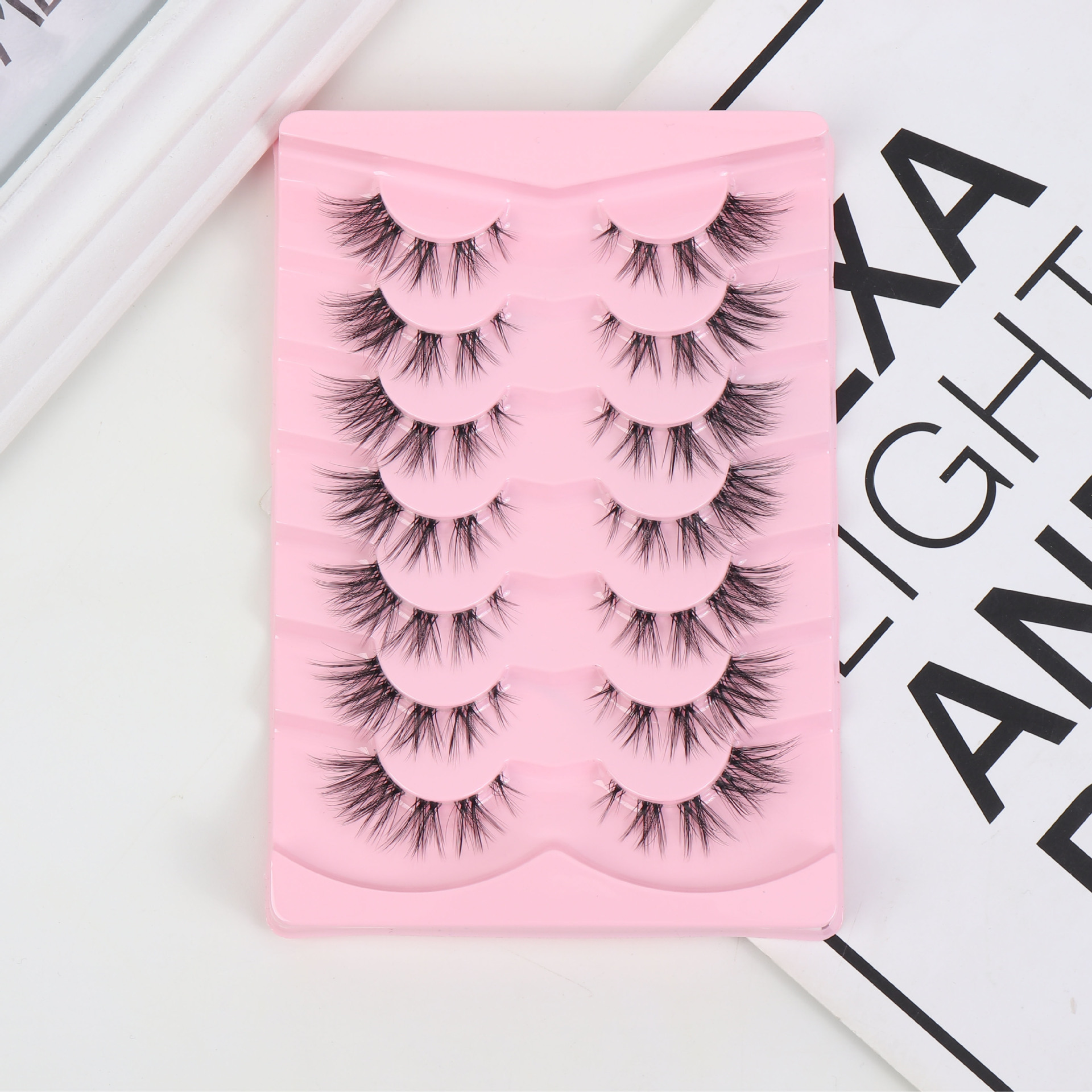 Manufacturers hot push European and American cross-border false eyelashes Fox series oblique flying one-piece eyelashes transparent stem chemical fiber eyelashes