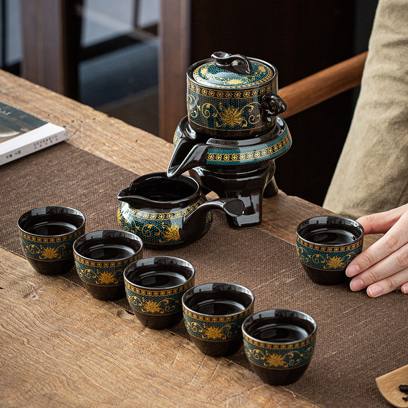 Lazy man semi-automatic tea set set creative Stone Mill rotating water kung fu tea maker household ceramic teapot gift