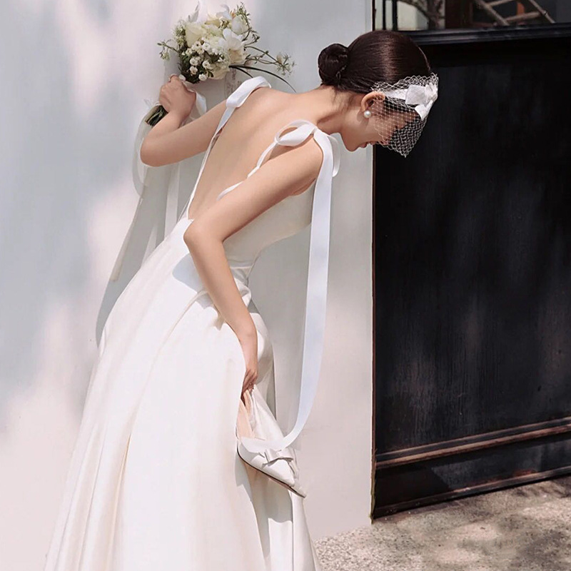 French-style light wedding dress sling niche high-grade bow outdoor travel photography engagement license small dress pettiskirt autumn