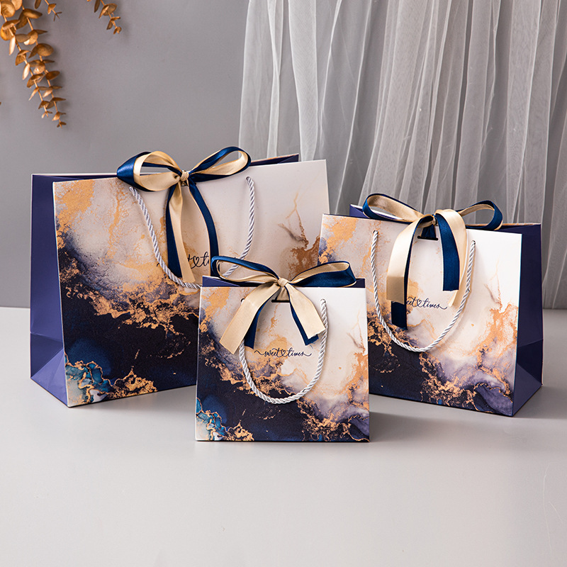 In stock sapphire blue marbling high-grade gift bag ribbon handbag cross-border color printing packaging bag foreign trade paper bag