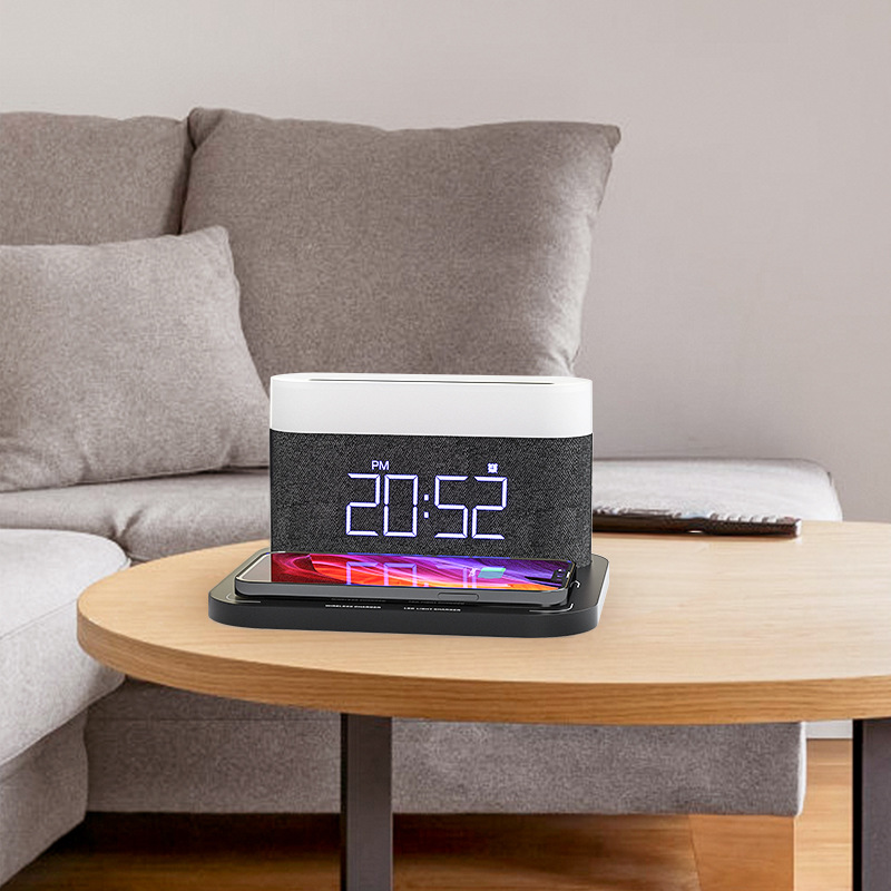 Shenzhen factory multifunctional three-in-one magnetic wireless charging LED time screen alarm clock 15W fast charging touch non-polar adjustment
