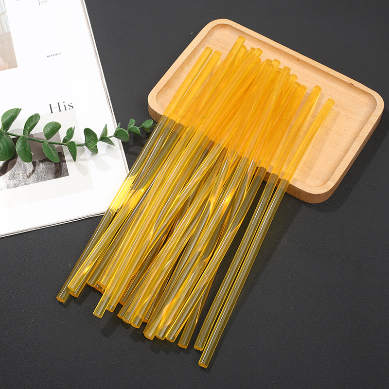 Spot wholesale golden yellow high transparent hot melt glue stick 7mm jewelry metal high viscosity thermoplastic resin adhesive