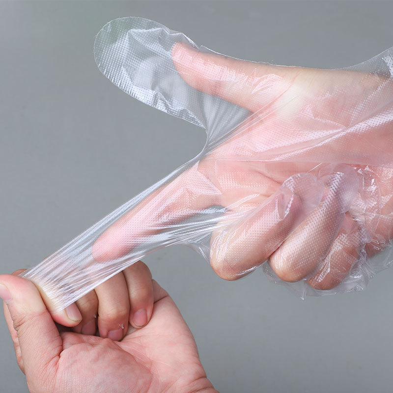 Disposable gloves food catering take-out beauty PE hairdressing thickened gloves disposable average size gloves wholesale