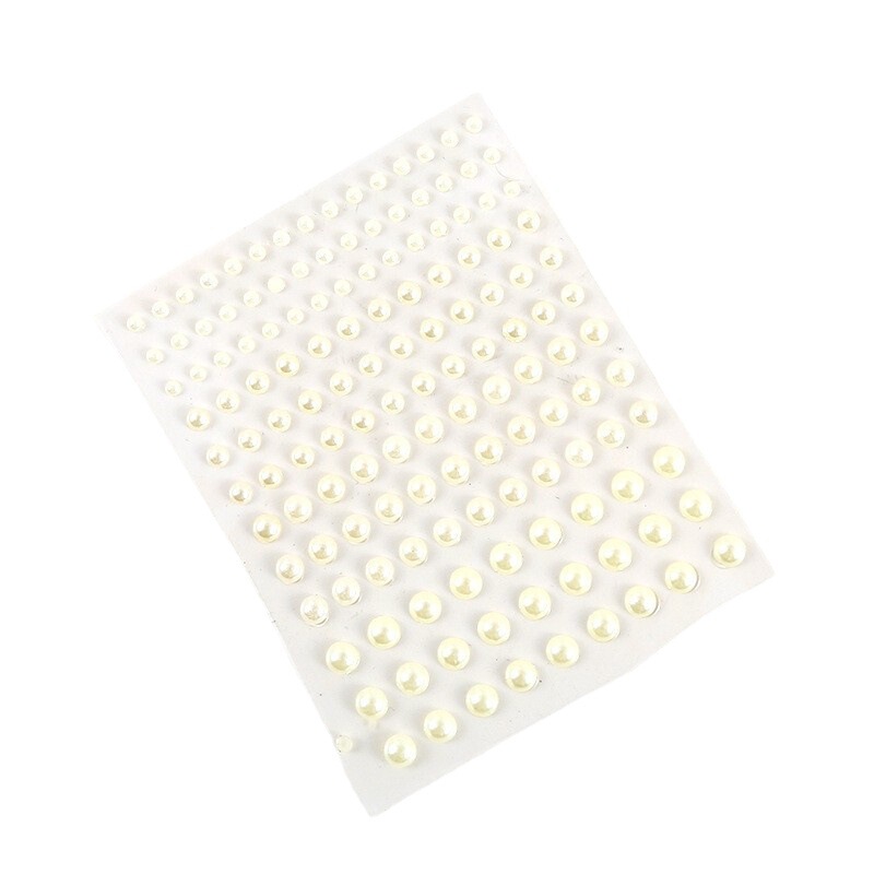 涙目に真珠をくっつけるパーティーは、接着剤のない眉間に目をくっつけて額の顔の水にアクリルの宝石の顔をくっつける|undefined