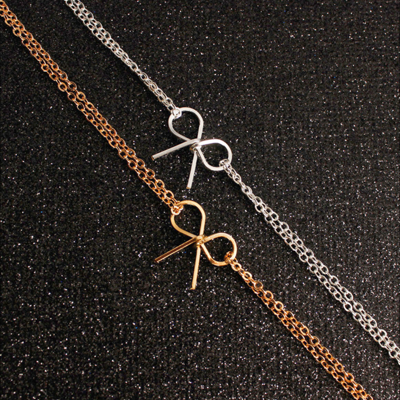 Europe and the United States cross-border jewelry personality Fashion female alloy double chain bracelet manufacturers direct supply simple bow bracelet