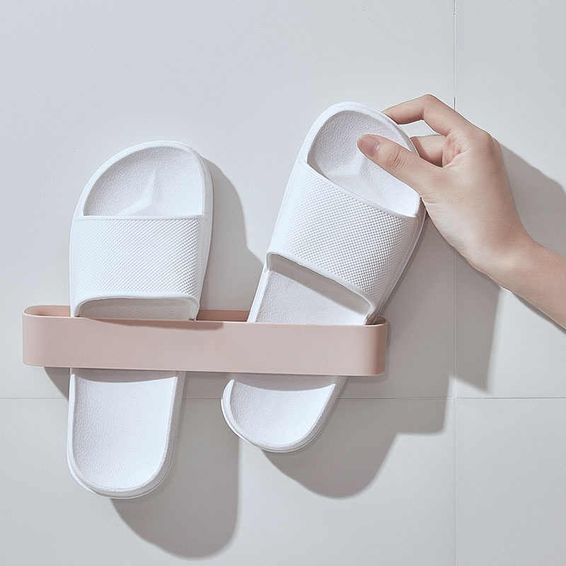 Bathroom wall-mounted slippers shelf space-saving seamless stickers storage rack wall paste shoe rack household department store wholesale