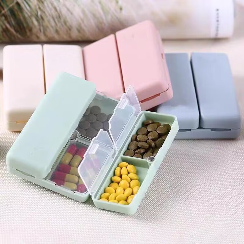 Wholesale portable 7-grid pill box independent folding double-layer storage box magnet magnetic seven-grid pill box