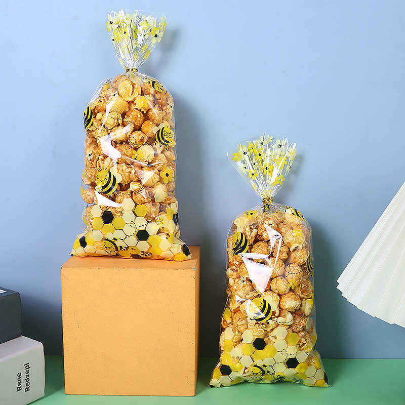 Spot small bee printing bag opp transparent flat bag candy biscuit packaging bag sealing tie silk plastic bag