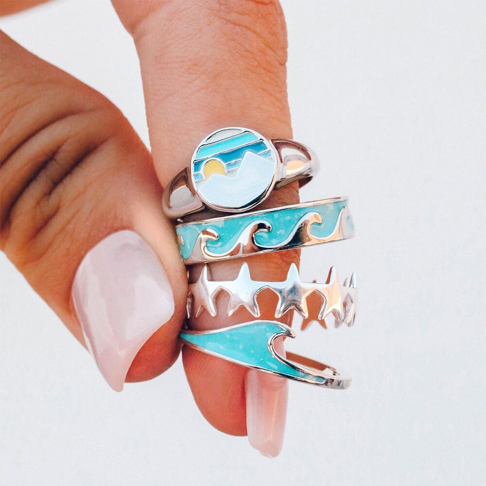欧美跨境新款时尚创意海浪戒指个性ins滴油星星日出戒指4件套首饰