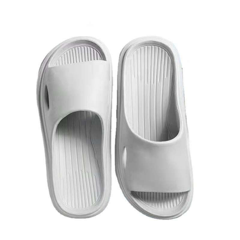 Wholesale New couple home non-slip hollow EVA slippers women's simple thick bottom dormitory sandals one-piece delivery