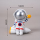 Resin decoration silver astronaut lifting stars