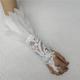 white gloves white feather