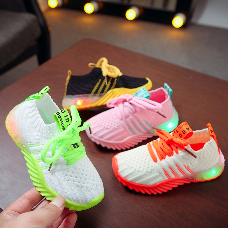 Internet famous LED bright light fly woven children's shoes 2019 autumn new light shoes luminous shoes men's and women's children's shoes knitted surface candy