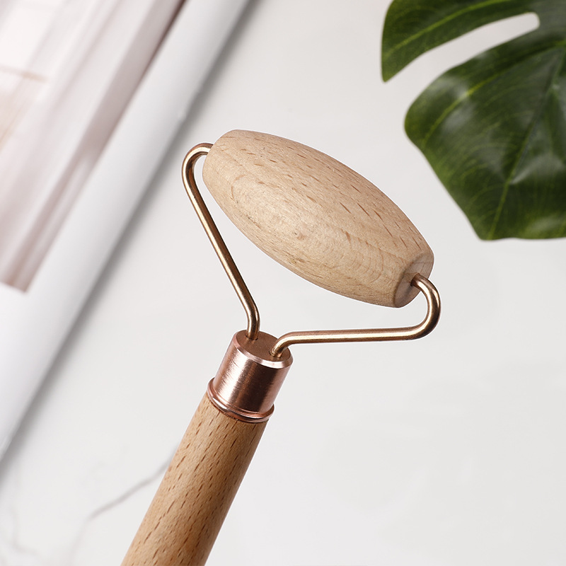 Wooden adsorption oil roller single head wholesale face massage roller handheld stall supply manufacturers