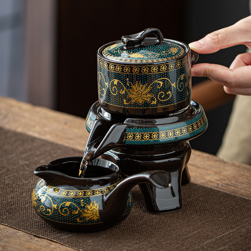 Lazy man semi-automatic tea set set creative Stone Mill rotating water kung fu tea maker household ceramic teapot gift