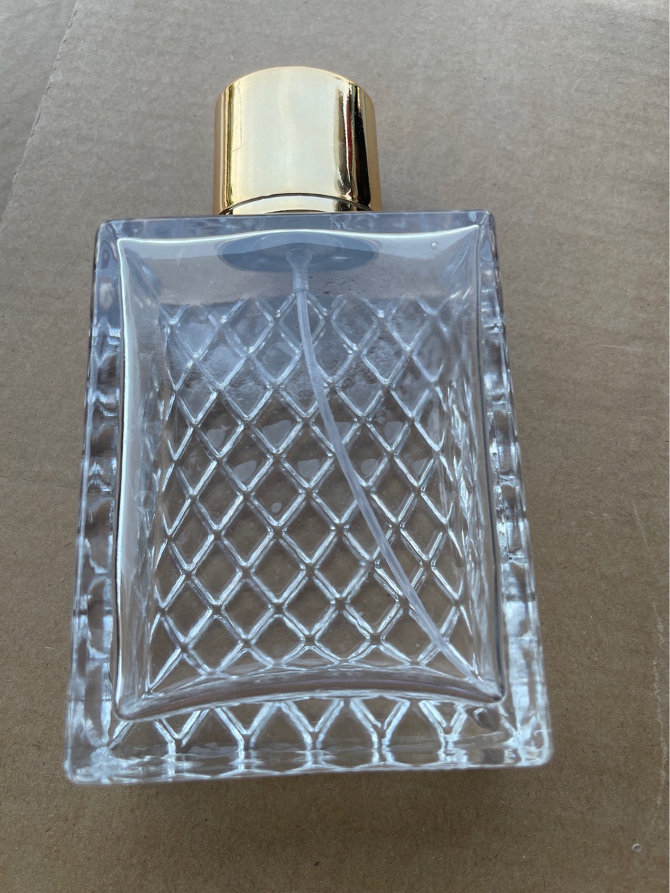 Spot 100ml grid thick glass spray bottle prismatic perfume bottle square makeup empty bottle