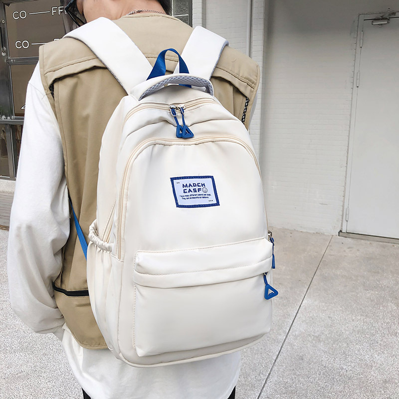 New Schoolbag Female Junior High School High School Students Large Capacity Simple Student Bag College Students Solid Color High Value Backpack