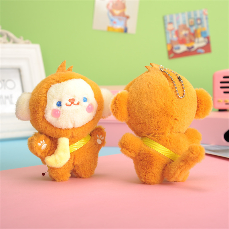 かわいい創意的なリュックサックの掛け物のプレゼントのサルのキーはぬいぐるみのバナナのサルの人形の車のキーチェーンの女性を掛けます。|undefined
