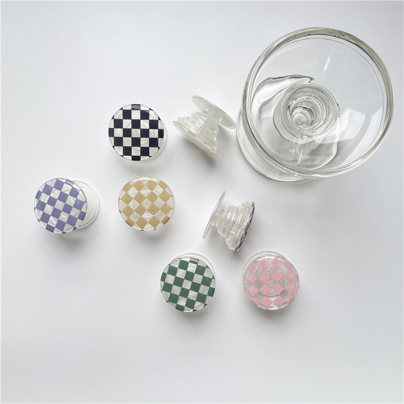 Cross-border foreign trade chessboard glue drop solid color transparent airbag bracket lazy retractable desktop mobile phone bracket DIY
