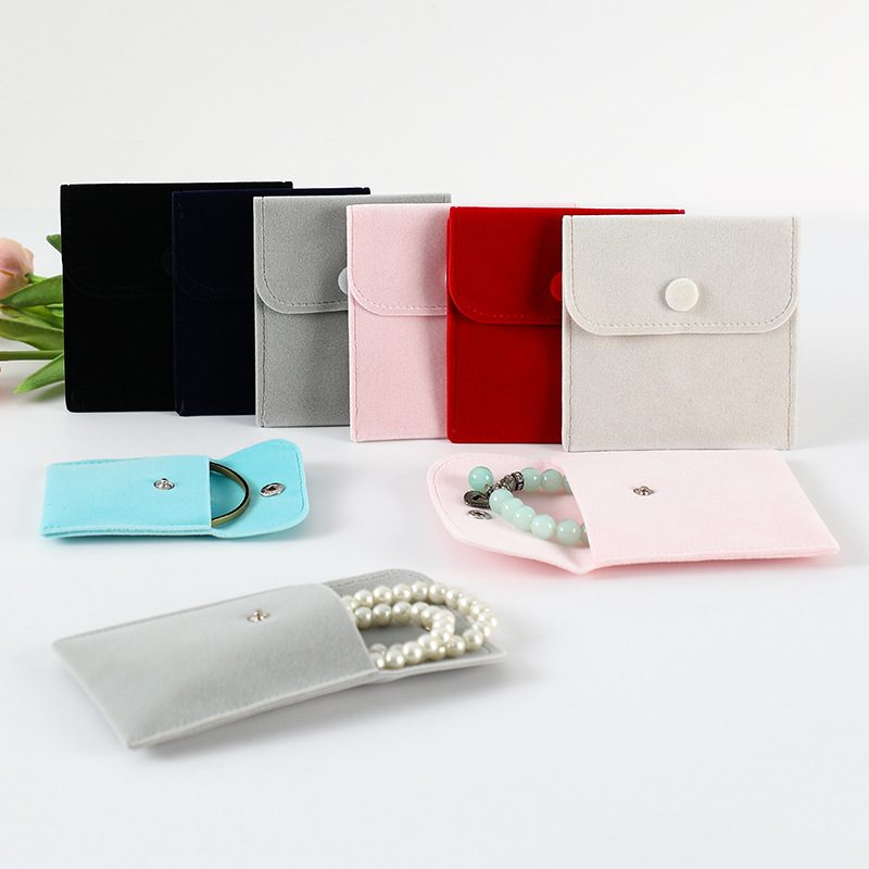 Factory wholesale velvet bag flip snap button jewelry bag earphone storage double-sided velvet jewelry necklace gift Lotus bag