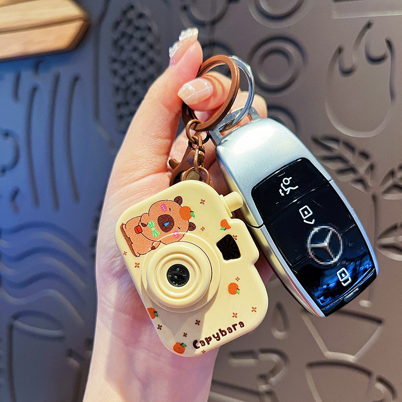 Original Capibala luminous projection camera keychain cute cartoon capybara bag pendant small gift