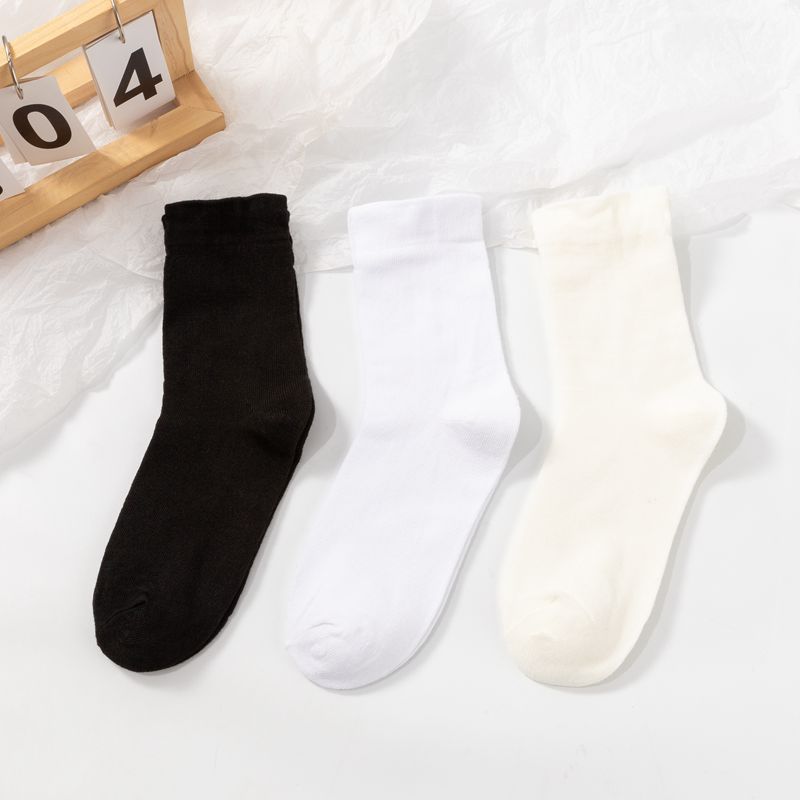 White pile socks women's mid-calf cotton socks ins trendy spring and autumn black summer loose mouth confinement stockings autumn and winter