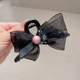 Black rhinestone bow grip clip