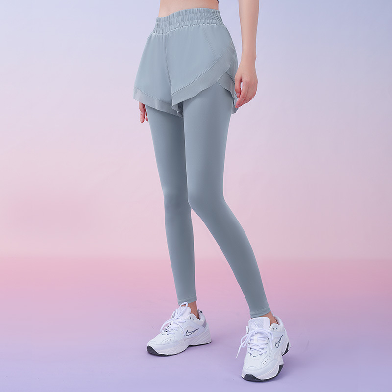 Peach mesh quick-drying trousers running fitness fake two-piece side pocket foot mouth stitching yarn matte fabric yoga pants for women