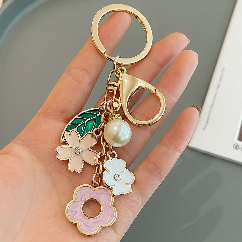 Korean style new style fresh cherry blossom keychain pendant metal Pearl Flower key chain girls' bag ornaments