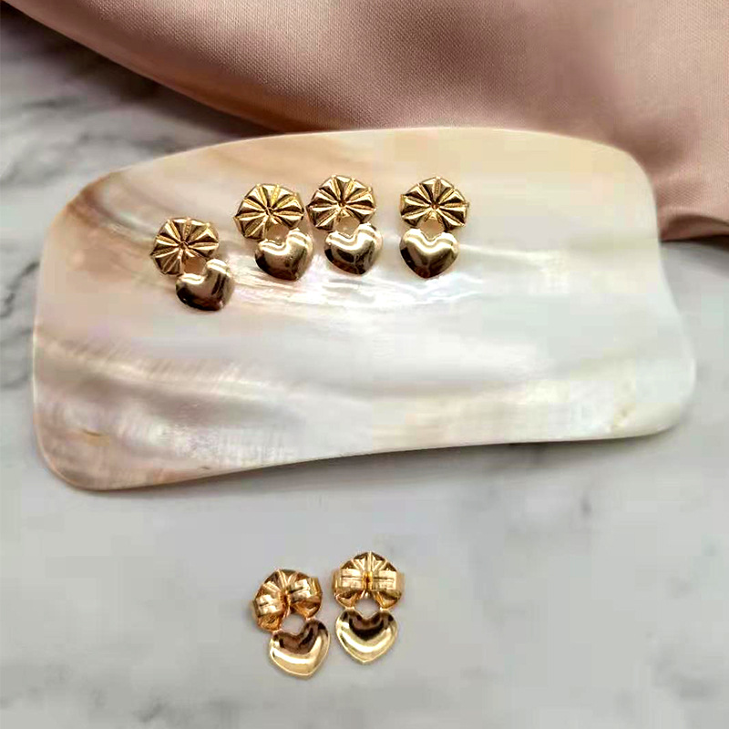 Earrings accessories copper ear studs auxiliary device European and American New TV heart-shaped ear plug ear studs Buckle Lifter