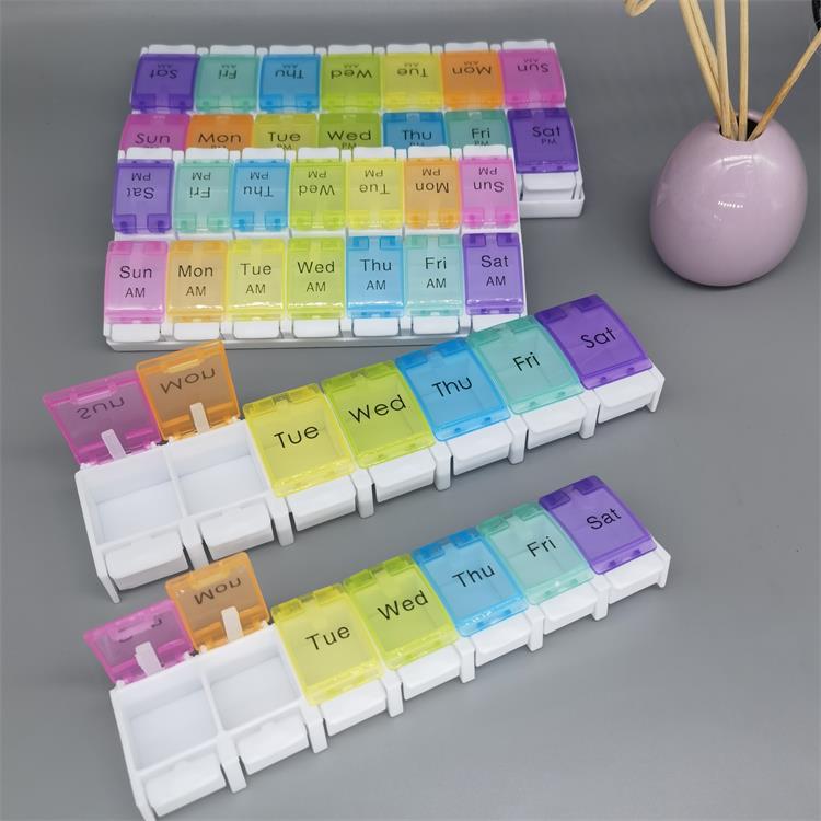 Double-row single-row one-week pill box with silicone press-type lid opening method 14-cell morning and evening week portable pill box