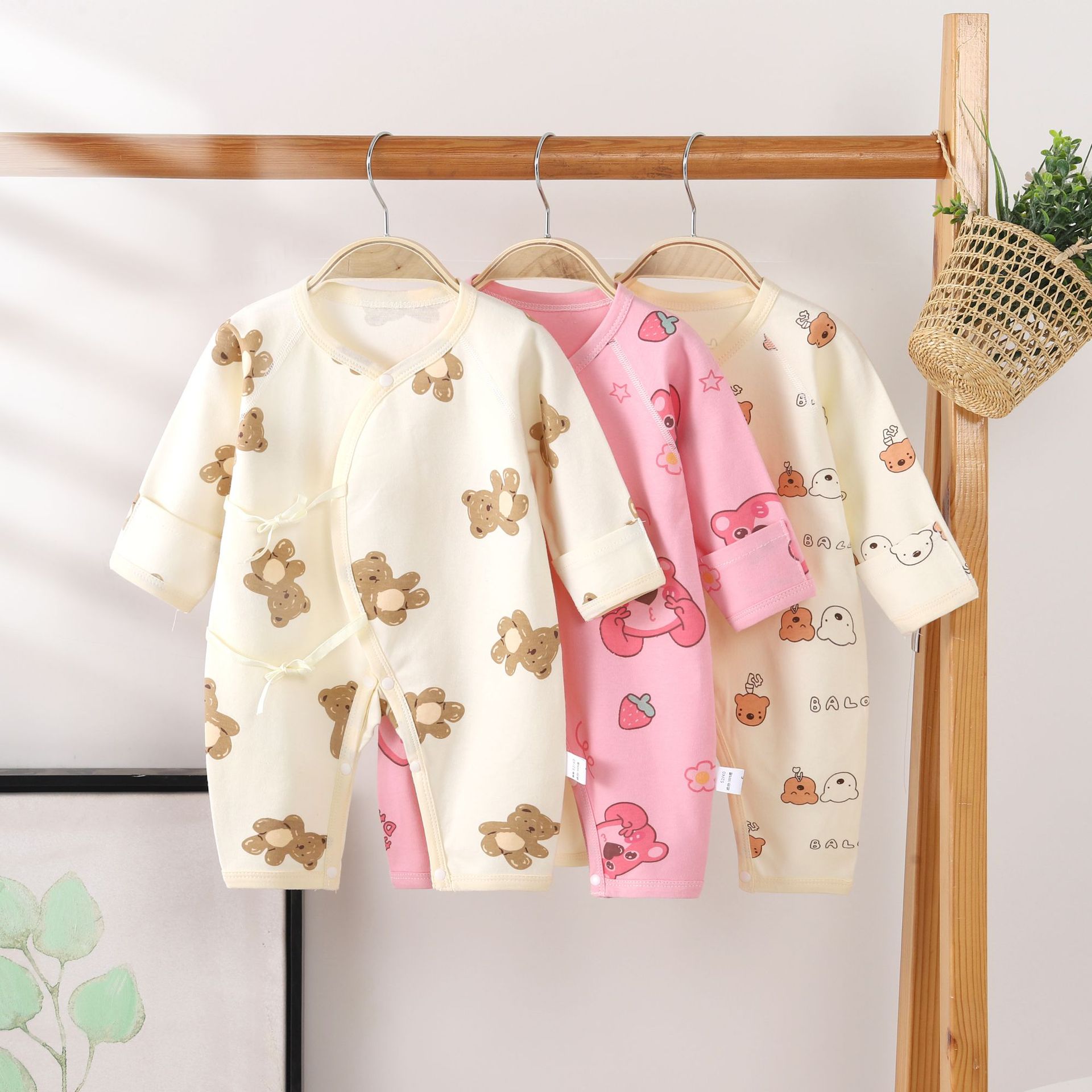 Baby boneless jumpsuit autumn and winter male and female baby long-sleeved lace-up Heshang clothing newborn cartoon printed butterfly clothing