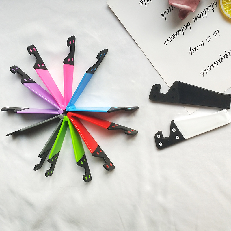 Mobile phone tablet V-shaped bracket desktop universal bracket folding triangle V-shaped bracket lazy mobile phone bracket wholesale