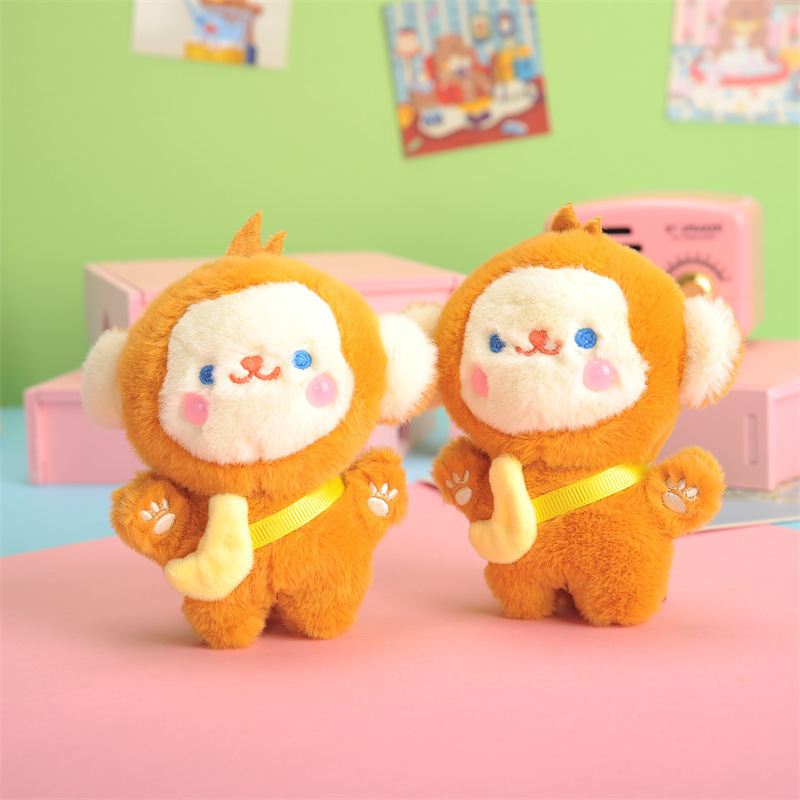 かわいい創意的なリュックサックの掛け物のプレゼントのサルのキーはぬいぐるみのバナナのサルの人形の車のキーチェーンの女性を掛けます。|undefined