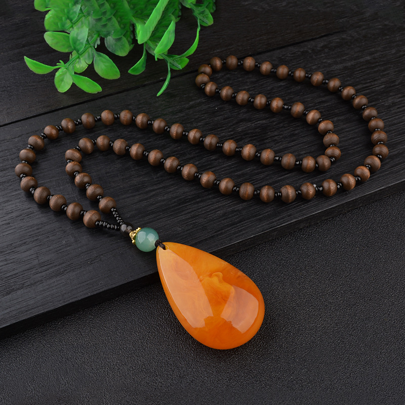 Old beeswax water drop necklace Amber long sweater chain peace buckle Peony Flower vintage men's and women's chicken oil yellow pendant