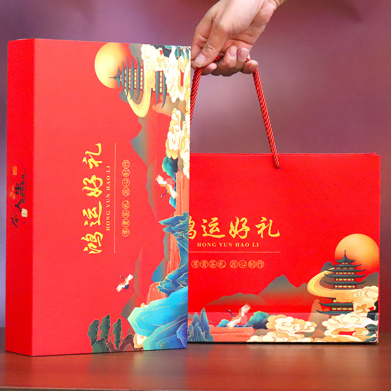 Three big tea Golden Junmei iron guanyin Red Robe Tea 9 small cans free tea set new year gift box