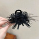 Black Flower Feather Clamp