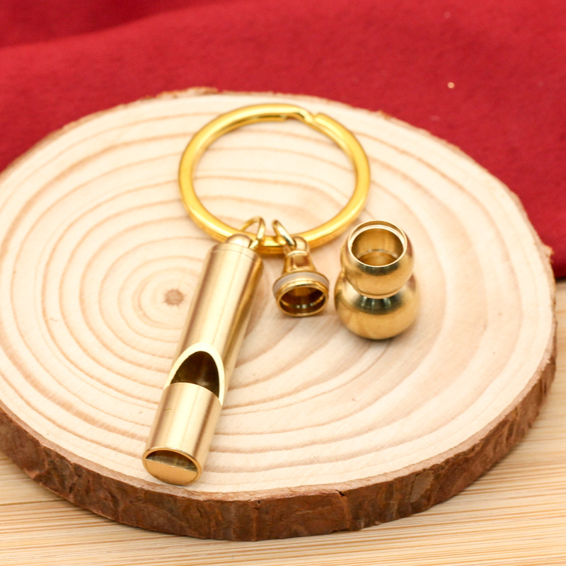 Brass whistle hollow small gourd keychain outdoor survival carry-on luggage pendant factory wholesale a generation of hair