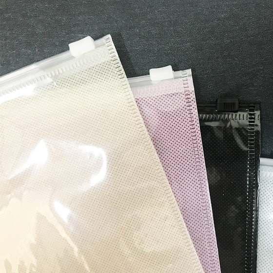 cpp transparent 6 silk one side transparent one side non-woven fabric 70g clothing packaging zipper bag wholesale