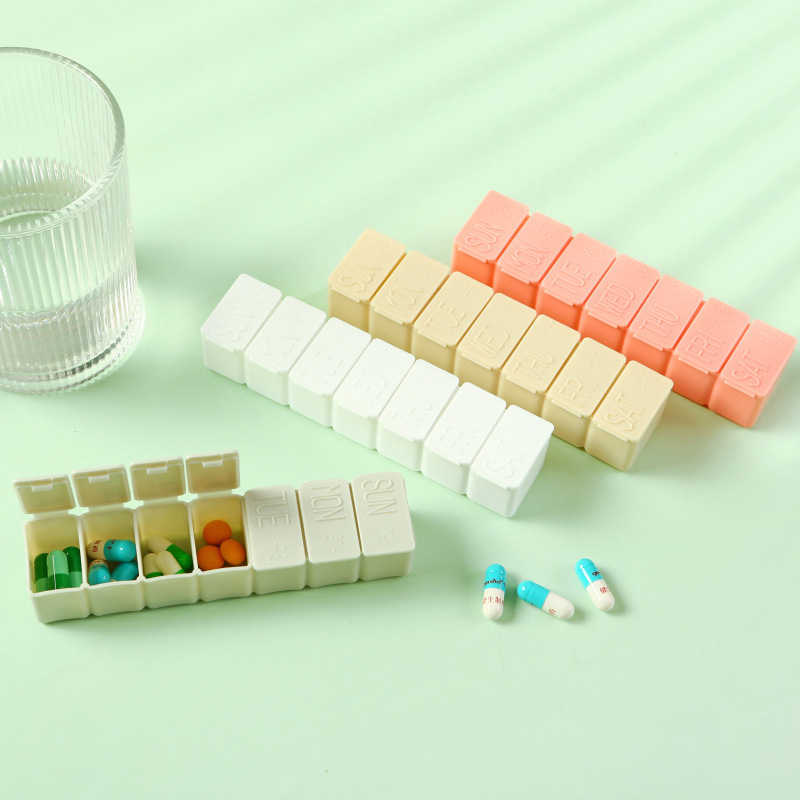 Wholesale weekly pill box strip-type 7-day pill box 7-grid sub-packing pill box convenient advertising storage box in stock