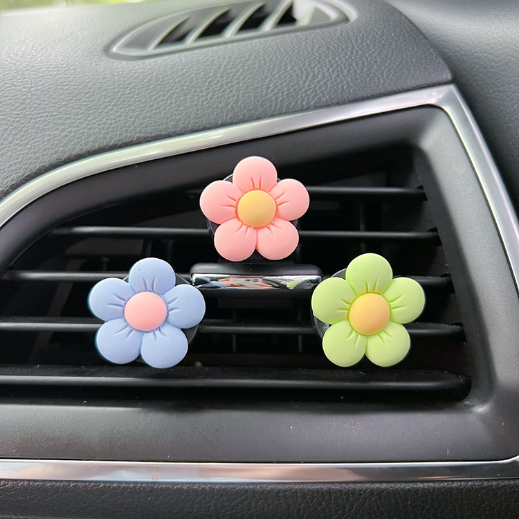 車の香水の香薫のエアコンの噴出口の置物insはらはらとしています。|undefined